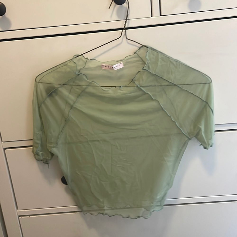 Sheer pastel green top